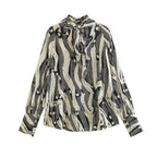 Monochrome Muse – Abstract Tie-Neck Blouse
