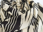 Monochrome Muse – Abstract Tie-Neck Blouse