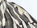 Monochrome Muse – Abstract Tie-Neck Blouse