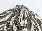 Monochrome Muse – Abstract Tie-Neck Blouse